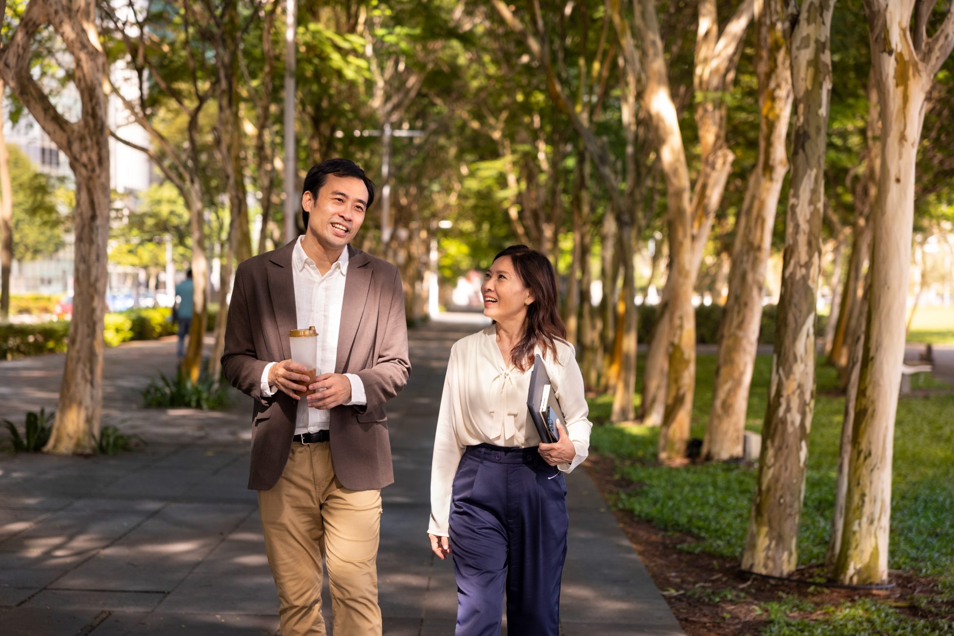 Colleagues working with laptop computer